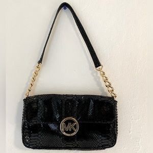 Michael kors black gold clutch
